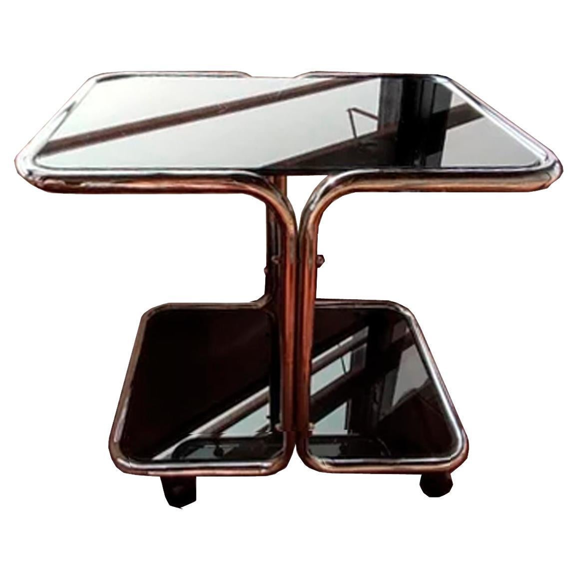  Coffee table steel tube and smoked glass with wheels Italy 70s For Sale