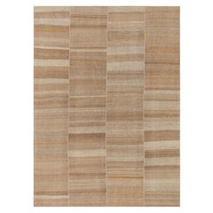 Tappeto kilim minimalista in lana intrecciata a mano, in stile vintage, nei toni del beige e del taupe