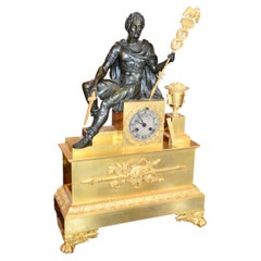 French  Empire Gilt and Patinated Bronze Clock of a Seated Roman Emperor
