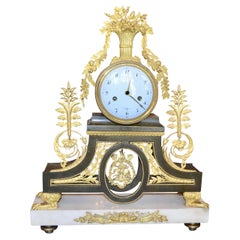 Antique Early 19th Century French Directoire Gilt Bronze and Marble Clock by Deverberie