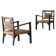 French modernist easy chairs in the manner of Francis Jourdain, 1940s