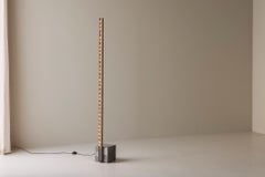 Sculptural Brutalist floor lamp in concrete and steel, 1980s.