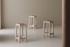 Off-white painted oak bar stools with woven rush seats, France 1950s