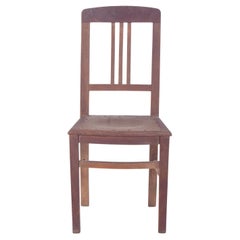 Chaise en bois du 20e siècle avec assise cloutée