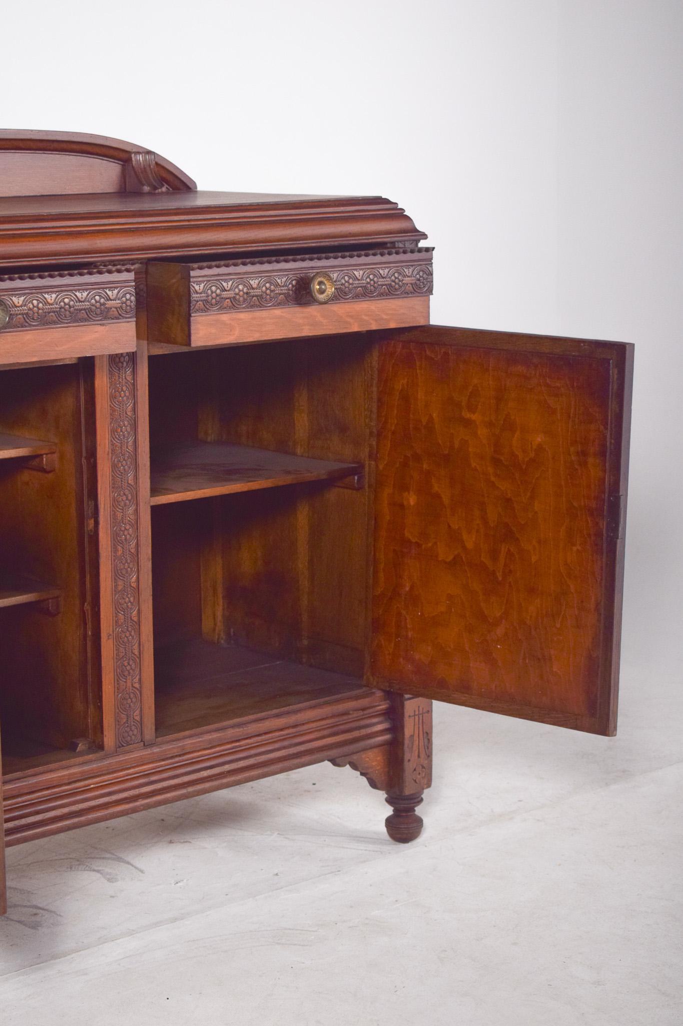 Antique English Tall Sideboard in Oak with a Small Elevation For Sale 6