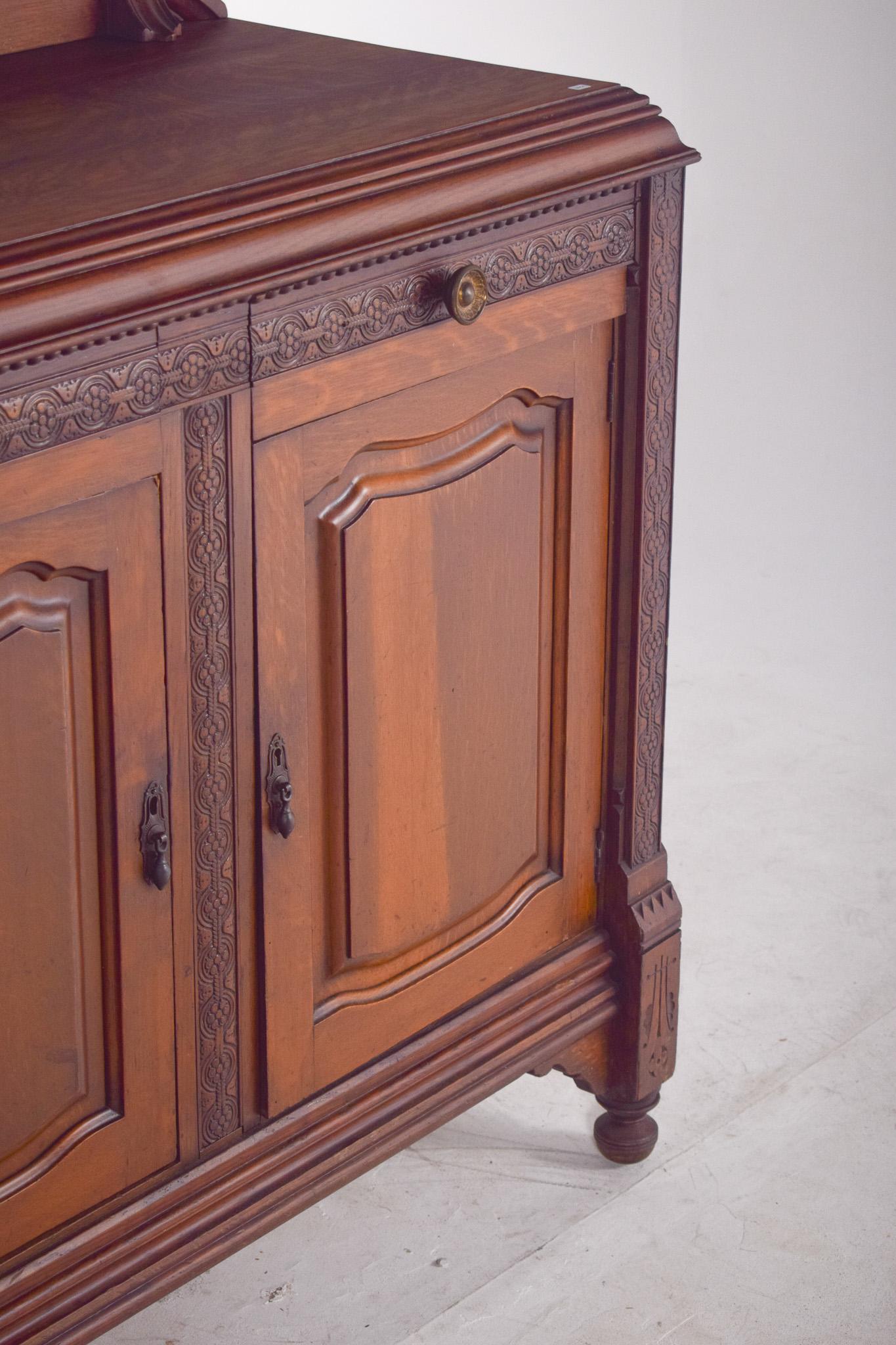Antique English Tall Sideboard in Oak with a Small Elevation For Sale 3