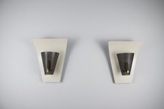 Par de apliques de metal perforado de Jacques Biny, Francia, década de 1960
