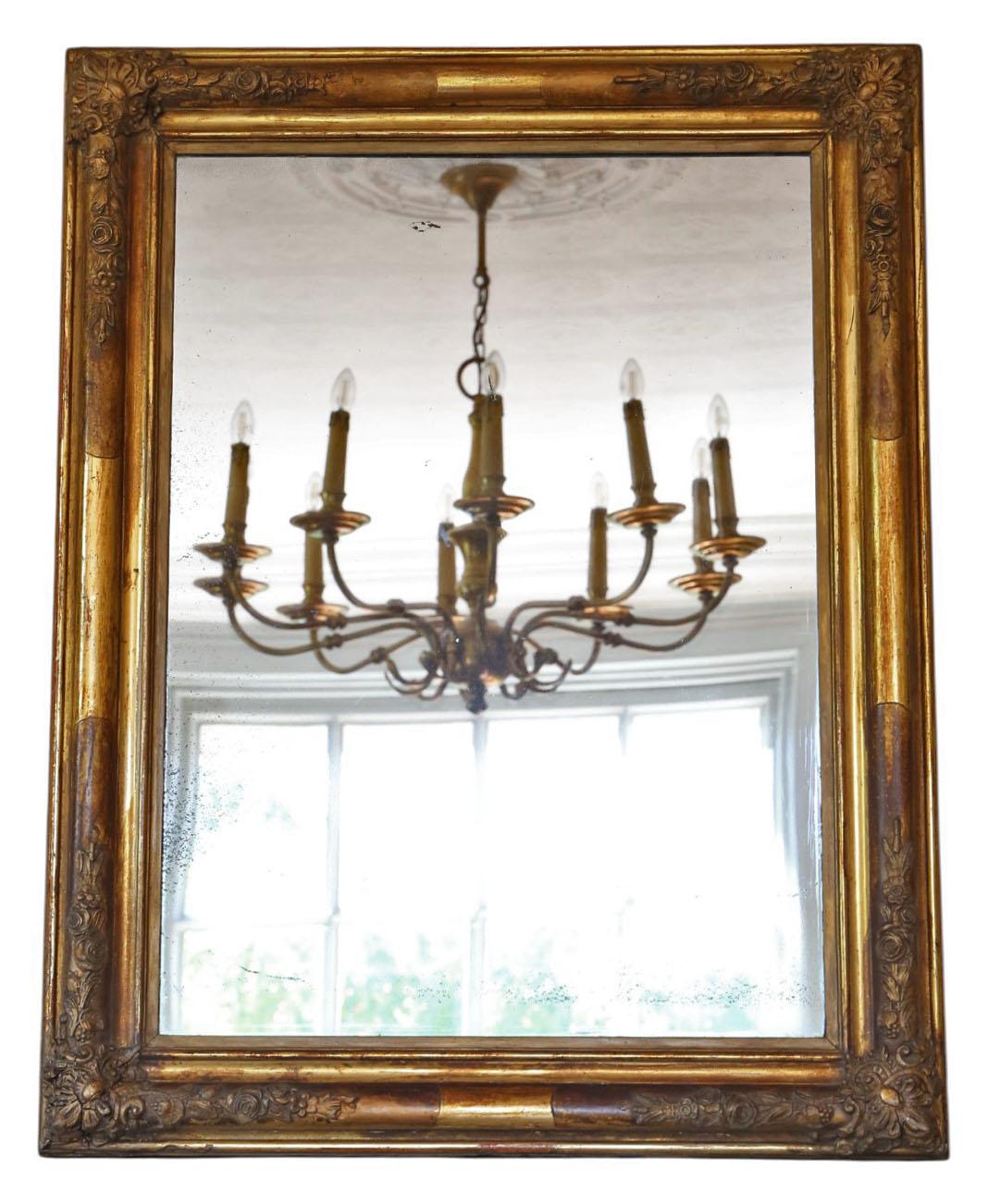 Large Antique 19th Century Gilt Overmantle Wall Mirror – Ornate Gold Frame, Vintage Home Decor

Add timeless charm to your interior with this large antique 19th-century gilt overmantle mirror, featuring an ornate yet understated gold frame. This