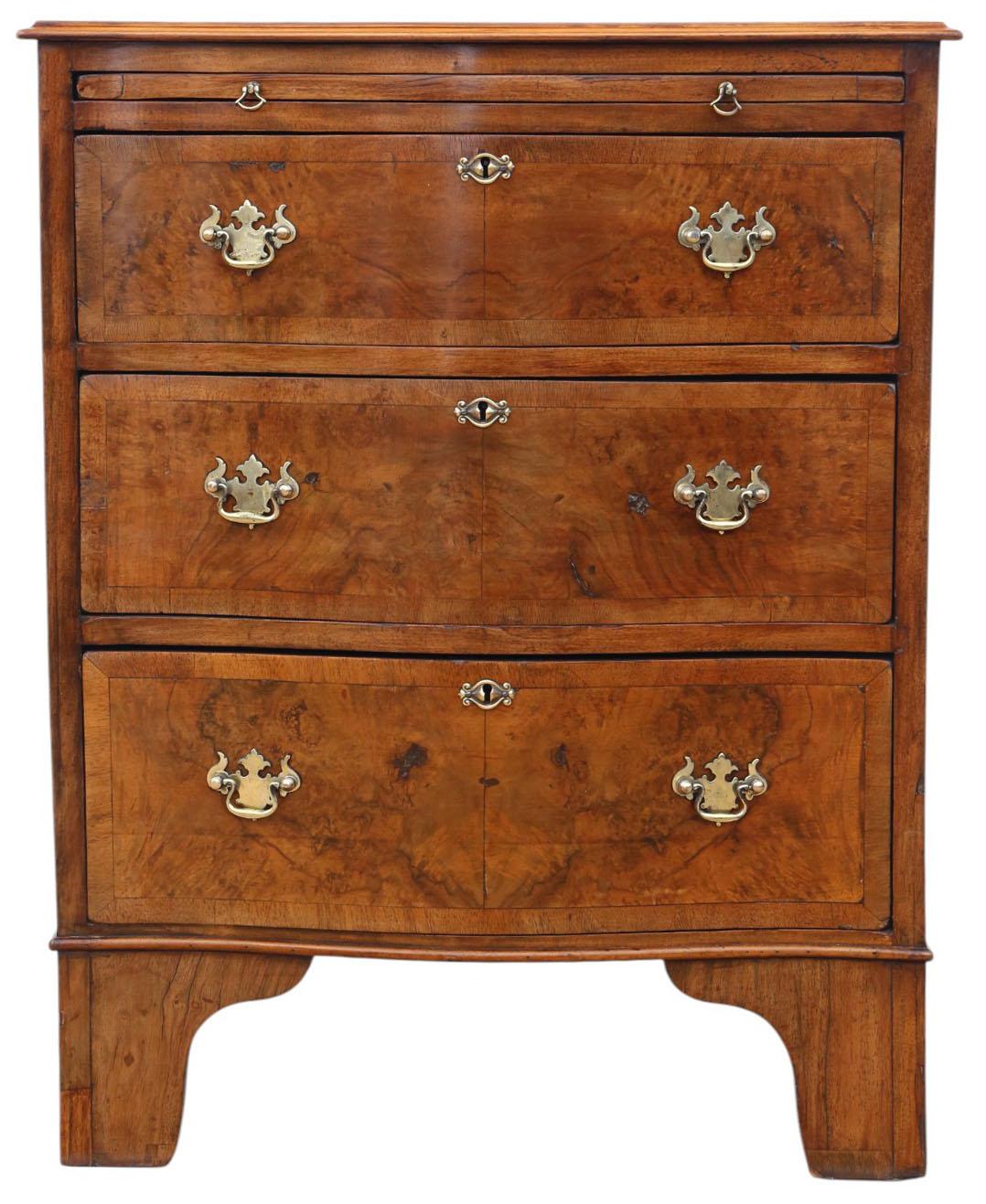 Antique c.1920 Georgian Revival Burr Walnut Serpentine Chest of Drawers – Fine Quality with Brushing Slide

A lovely quality Georgian Revival Burr Walnut Serpentine Chest of Drawers dating from around 1920. This rare and decorative piece features