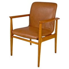Italian mid-century modern wooden brown leather armchair Anonima Castelli 1960s