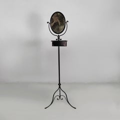 Italian black metal console with mirror and drawer, late 1800s