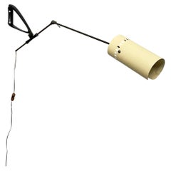 Italian mid-century modern adjustable wall lamp in metal and brass, 1950s
