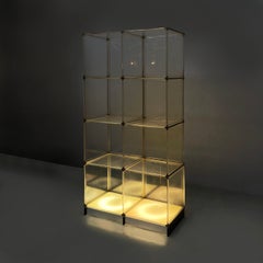 Italian Space Age bookcase with lamp in plexiglass and metal, 1970s