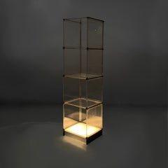 Italian Space Age bookcase with lamp in plexiglass and metal, 1970s
