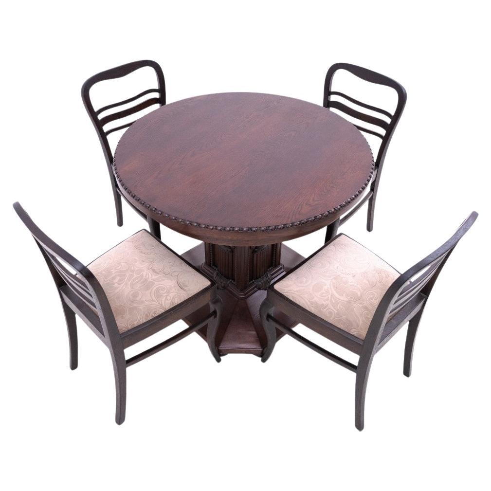 Antique table + chairs set, Western Europe, early 20th century.