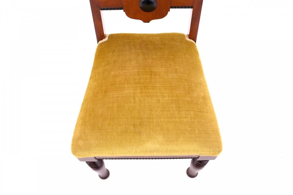A table and four chairs from the early 20th century. For Sale 2