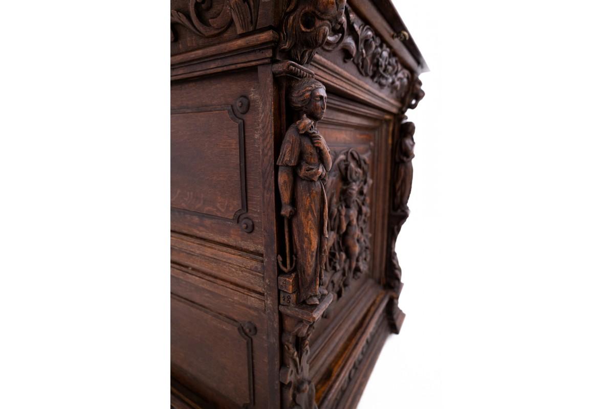 Oak Carved chest of drawers, France, circa 1840. For Sale