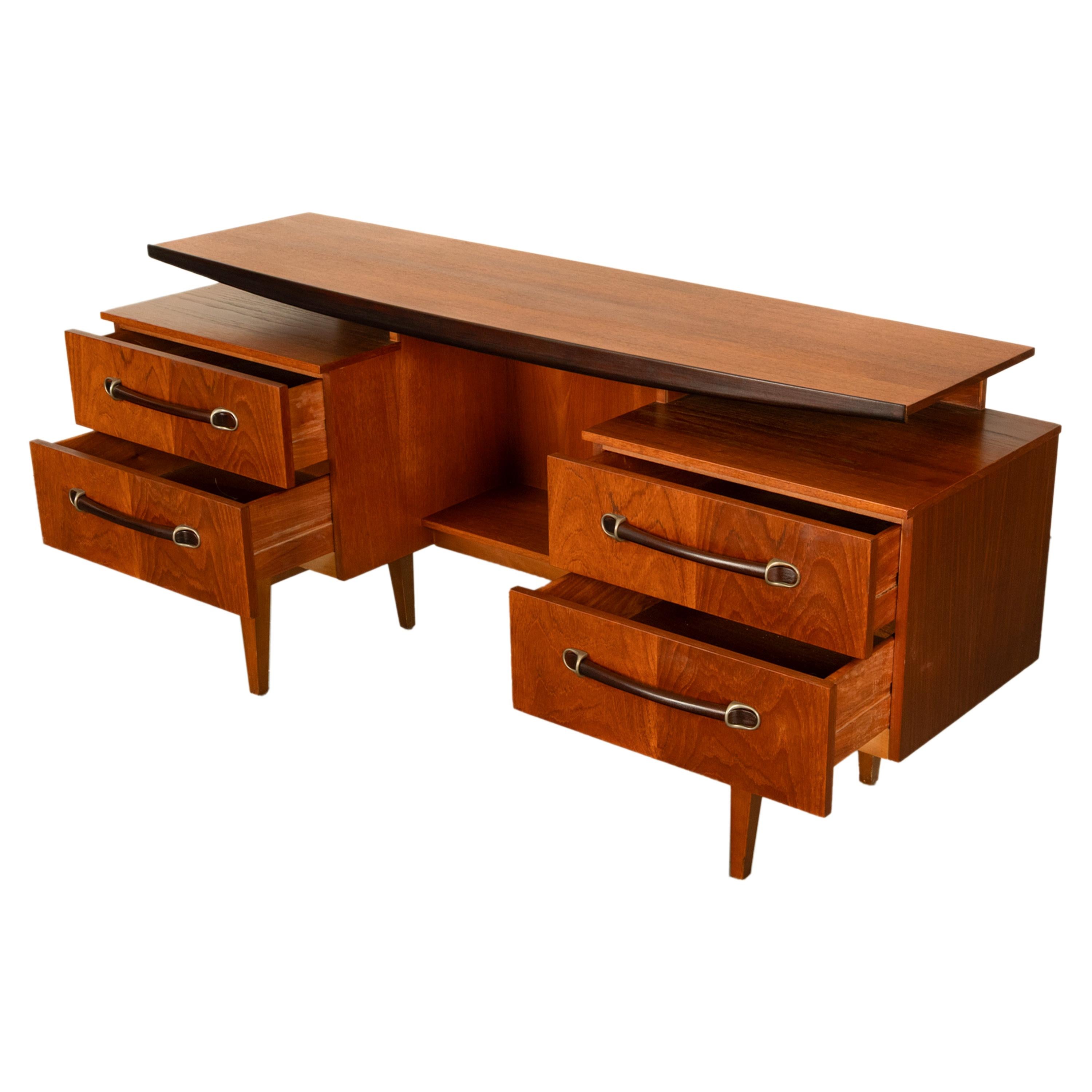 Vintage Danish Mid Century Modern Teak Four Drawer Desk with Floating Top 1965 For Sale 4