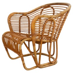 Poltrona danese in rattan disegnata da Tove Kindt-Larsen per R. Wengler, anni ’40.