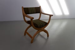 Dänischer „Kurul“-Sessel aus Eiche und grün gestreifter Wolle von Henning Kjærnulf, 1960er Jahre.