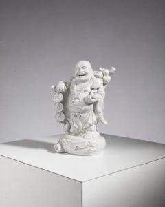 An ancient smiling Buddha from the Republic period, made of Chinese porcelain