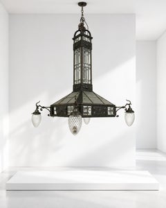 A large and magnificent Italian Art Nouveau chandelier made of wrought iron