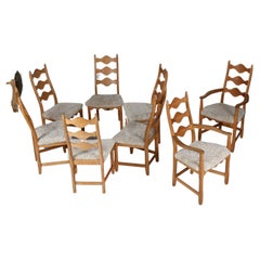 Vintage Danish Henning Kjærnulf Style 2 + 6 Chairs of Solid Oak with Sheep Skin 1970s
