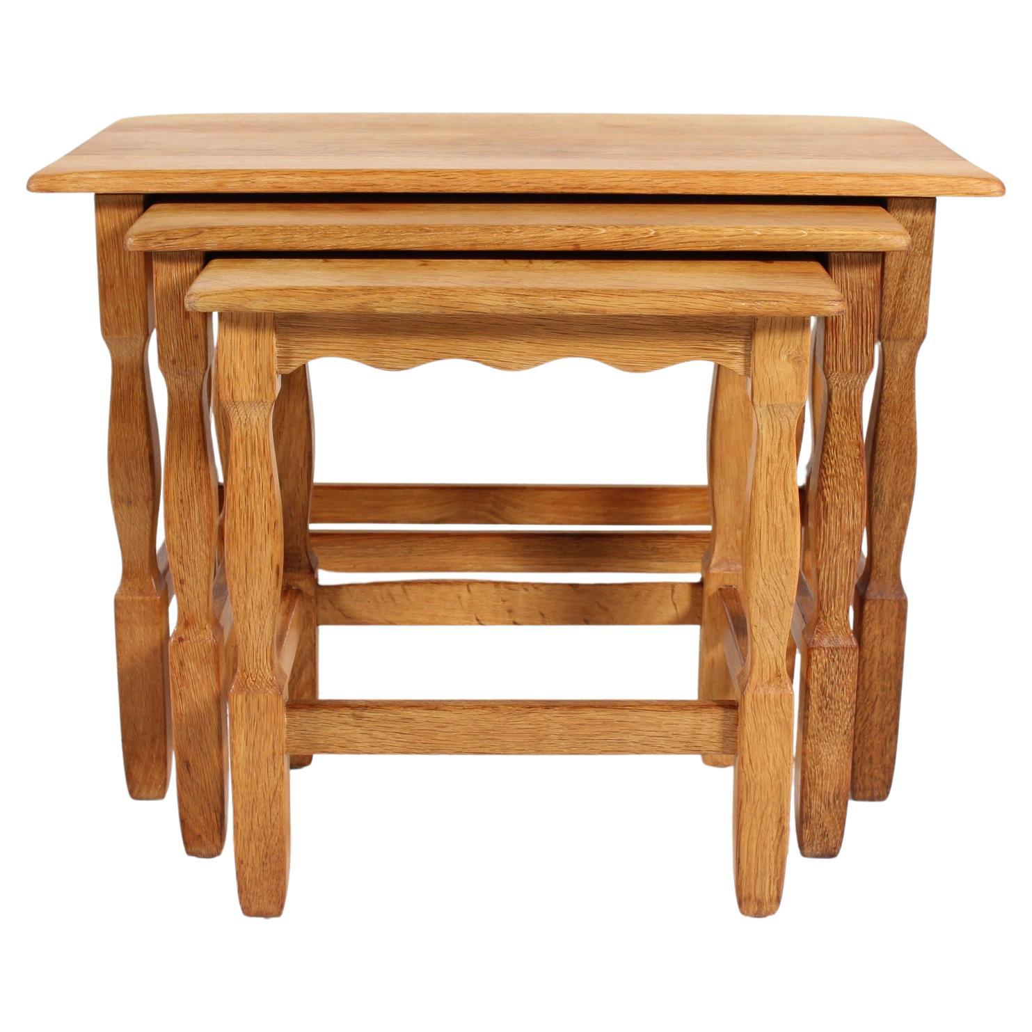 Danish Henning Kjærnulf style Set of Nesting Tables of Solid Oak, 1970s For Sale