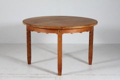 Danish Round Extendable Dining Table of Oak in Henning Kjærnulf style 1970s