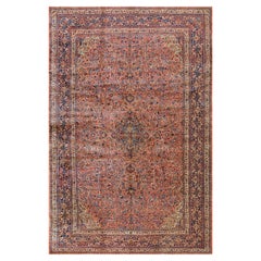 Alfombra Dabir de Kashan de principios del siglo XX, de estilo tradicional, con motivos florales en tonos rojo óxido