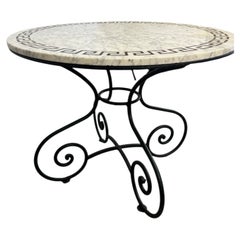 Round Marble Top Table with Greek Key Inlay and Wrought Iron Scroll Base