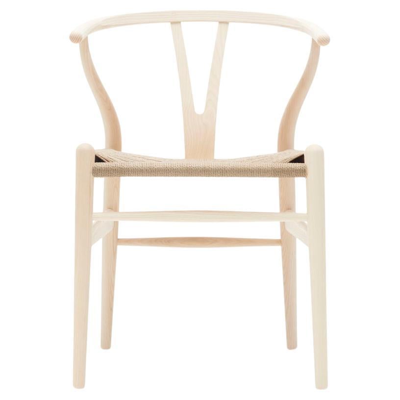 This chair is offered in Oak, Ash, Beech, Walnut and Mahogany in a variety of finishes (Soap, Lacquer, Oil, White Oil, Smoked Oil, and Painted), with either a Natural Papercord or Black paper cord seat.  Priced as shown in Oak Soap with Natural
