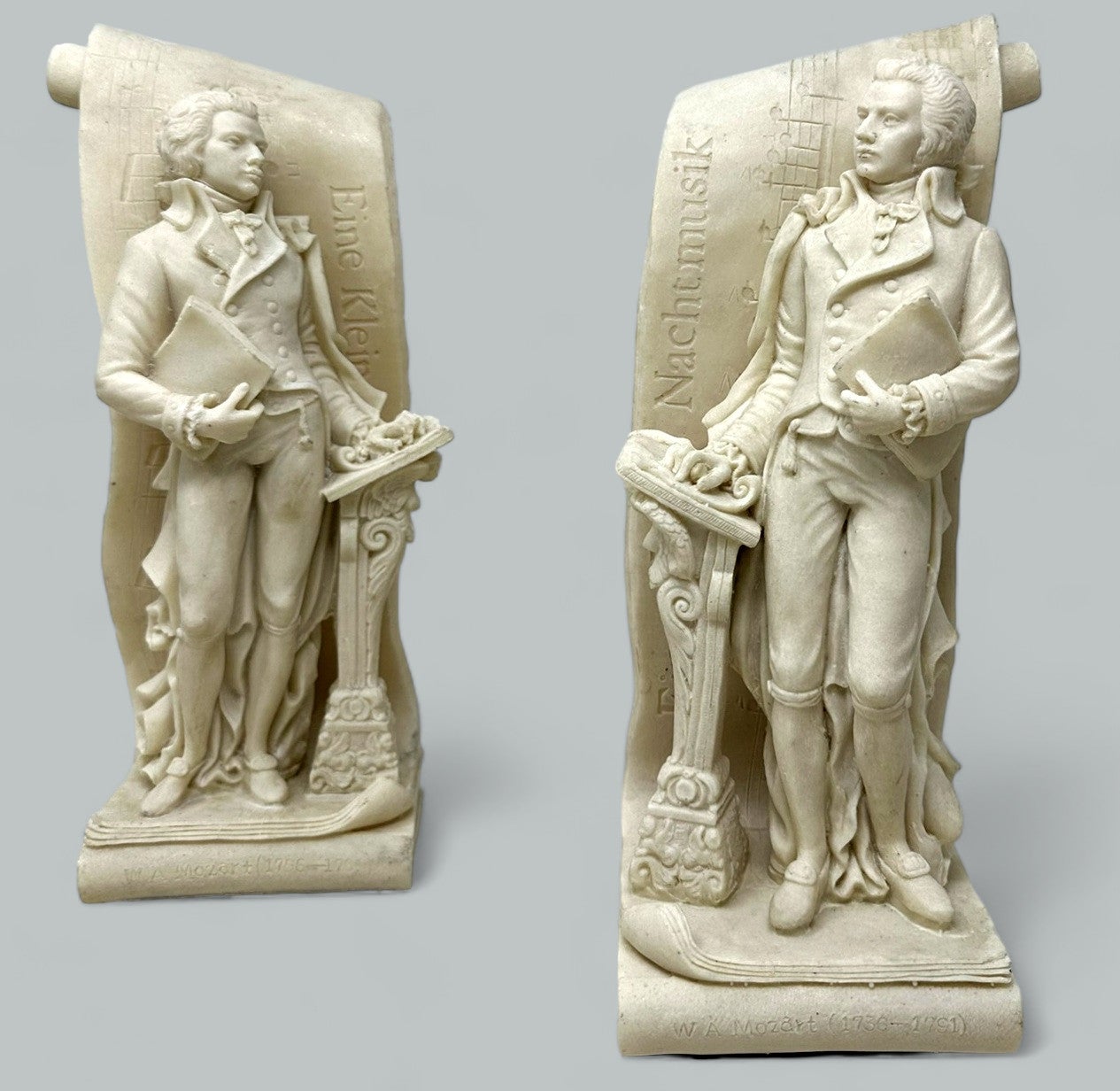 Paire de sculpteurs musiciens masculins d'antiquités serre-livres Wolfgang Amadeus Mozart