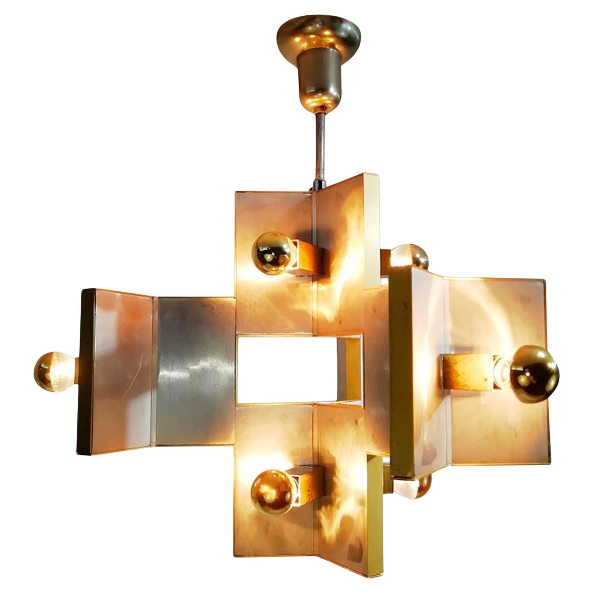 Élégant lustre sculptural en laiton et métal miroir de Sciolari, 1970 en vente