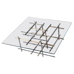 Mikado, Couchtisch aus hand poliertem Edelstahl, gebürstetem Messing und Glas