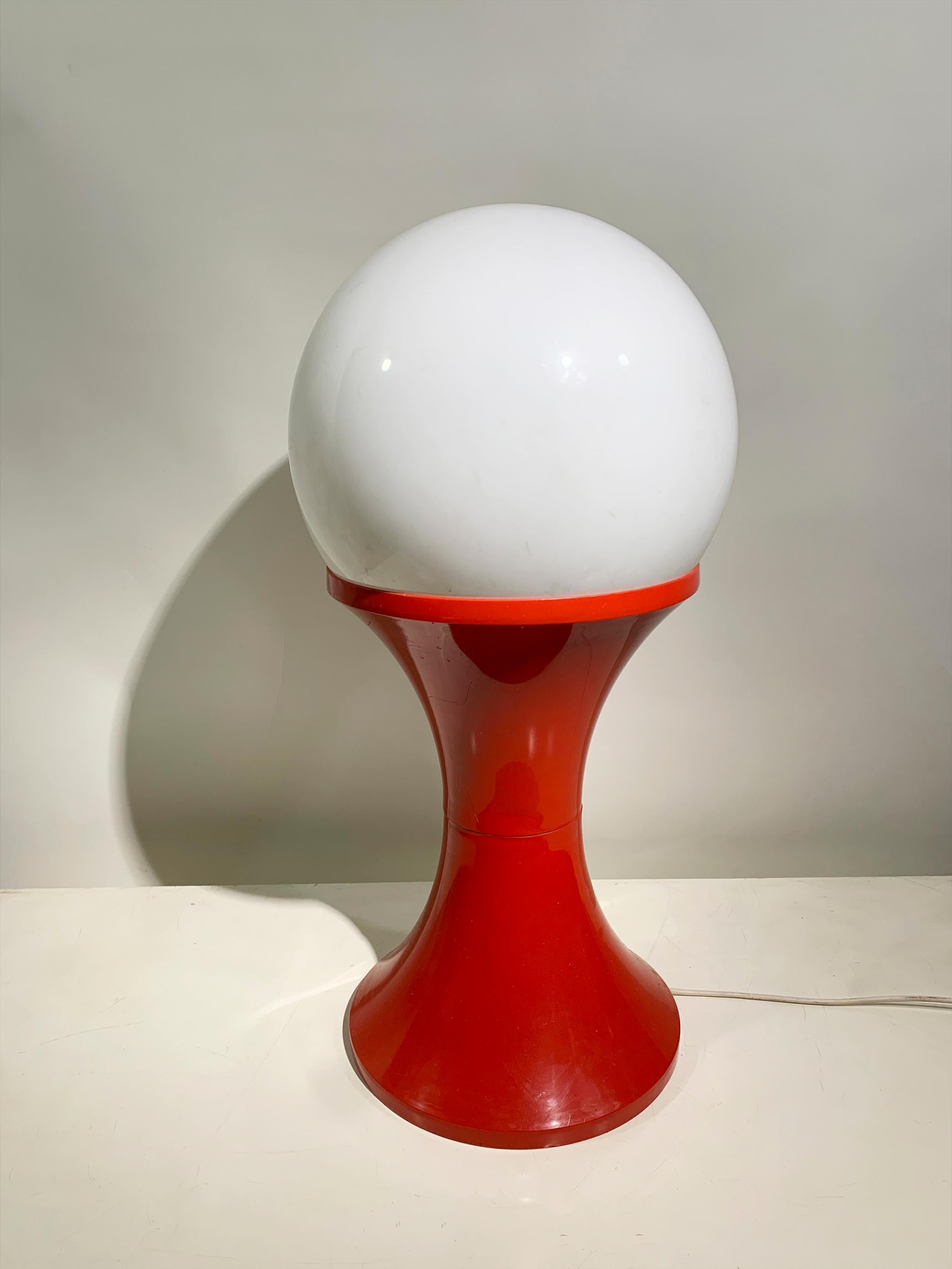 this vibrant and iconic Space Age floor lamp. Embodying the optimism and innovation of the 1960s and 1970s, this piece features a bold, sculptural form typical of the era's cutting-edge design.

This floor lamp boasts a pristine, luminous white