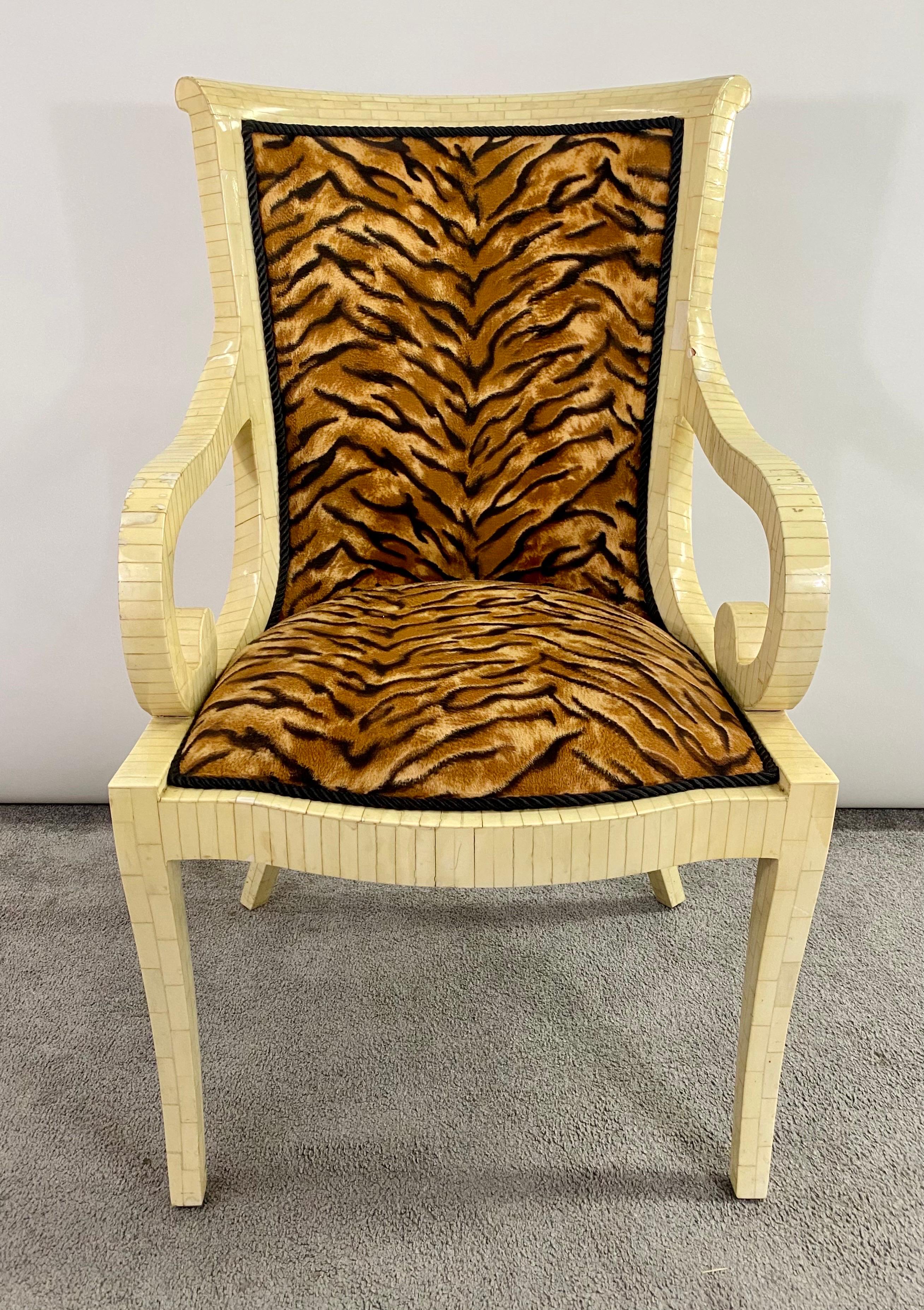 Pair of Enrique Garcel off-white bone style armchairs. Each tessellated form armchair with scrolling arm and body type. Both stylish and sleek showing off a nice leopard upholstery fabric. Having been previously touched up in a professional