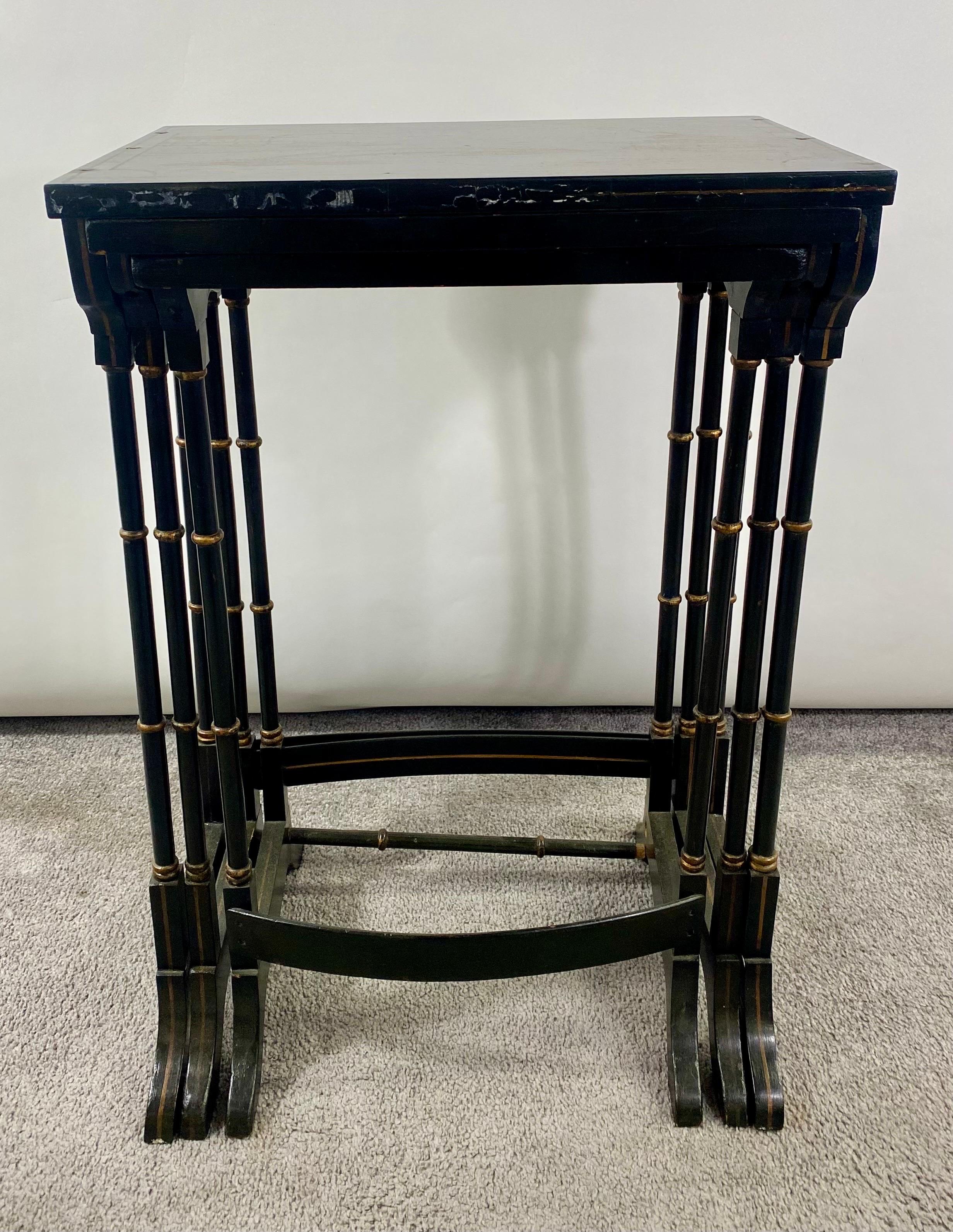 Early 20th century chinoiserie black lacquered Japanned nesting tables, set of 3
A classy set of three early 20th century chinoiserie decorated japanned nesting tables. Each Table is having black lacquer japanned finish and features hand painted