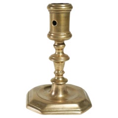 Small 17th Century French Bronze Candlestick with Cut-Corner Base