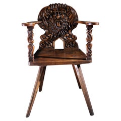 17th Century Alpine Carved Walnut Sgabello Armchair with Grotesque Mask
