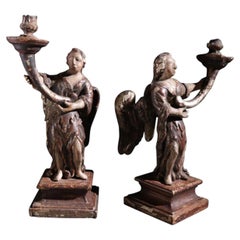 Pair of Spanish Baroque Polychrome Carved Angel Candleholders, circa 1690