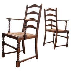 Pair of English Oak Ladder-Back Armchairs with Bobbin Turning and Rush Seats