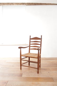 Sessel aus niederländischer Eiche mit Leiterlehne, Binsensitz und gedrechselten Endknöpfen, 1950er Jahre