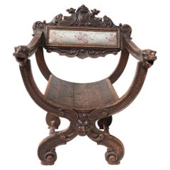 Carved Renaissance Revival Dantesca Chair with Lion Heads, France, 19th C.