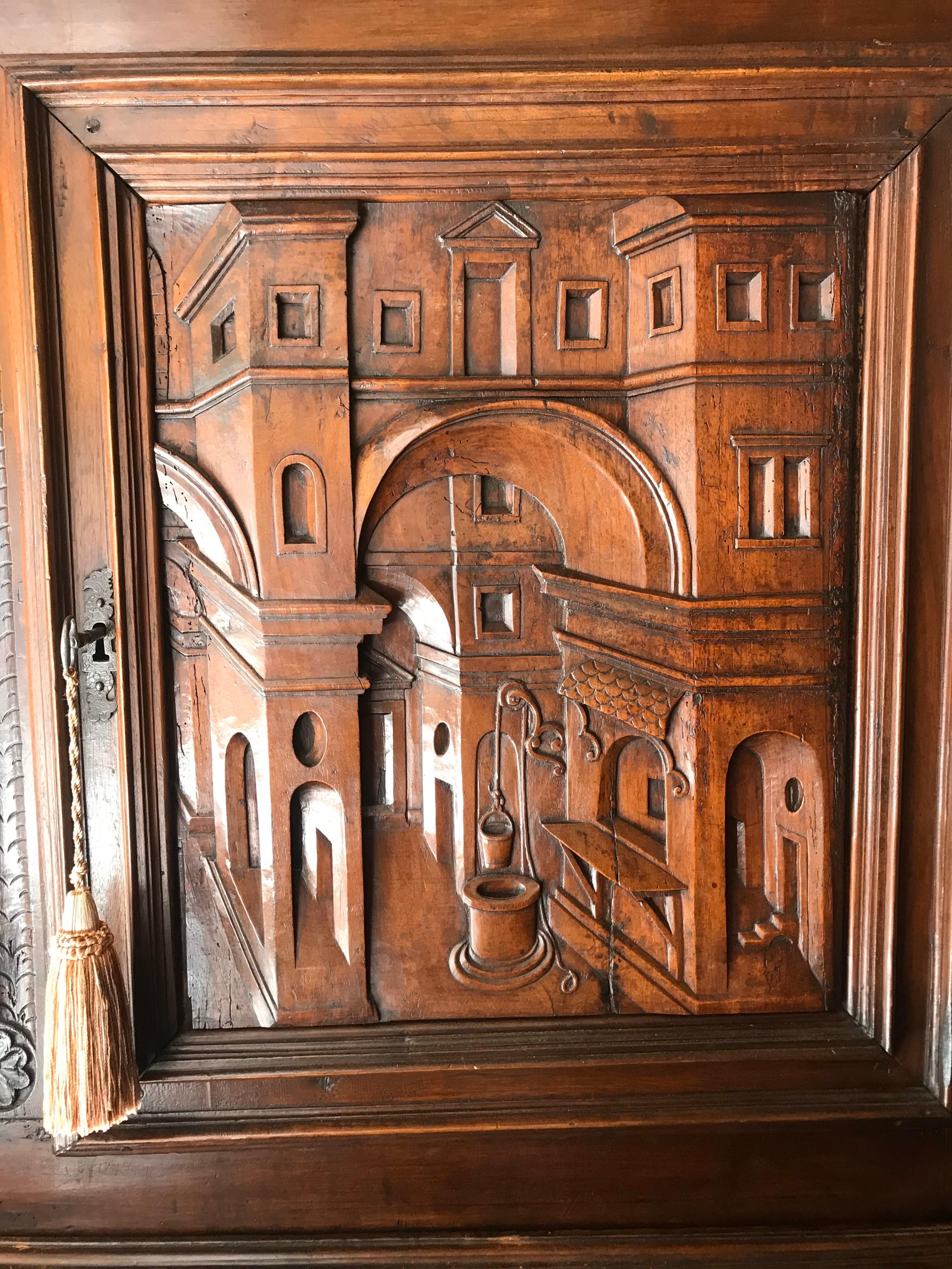 18th Century Italian Carved Walnut Cupboard with Italian Scenes Carved in Doors 3