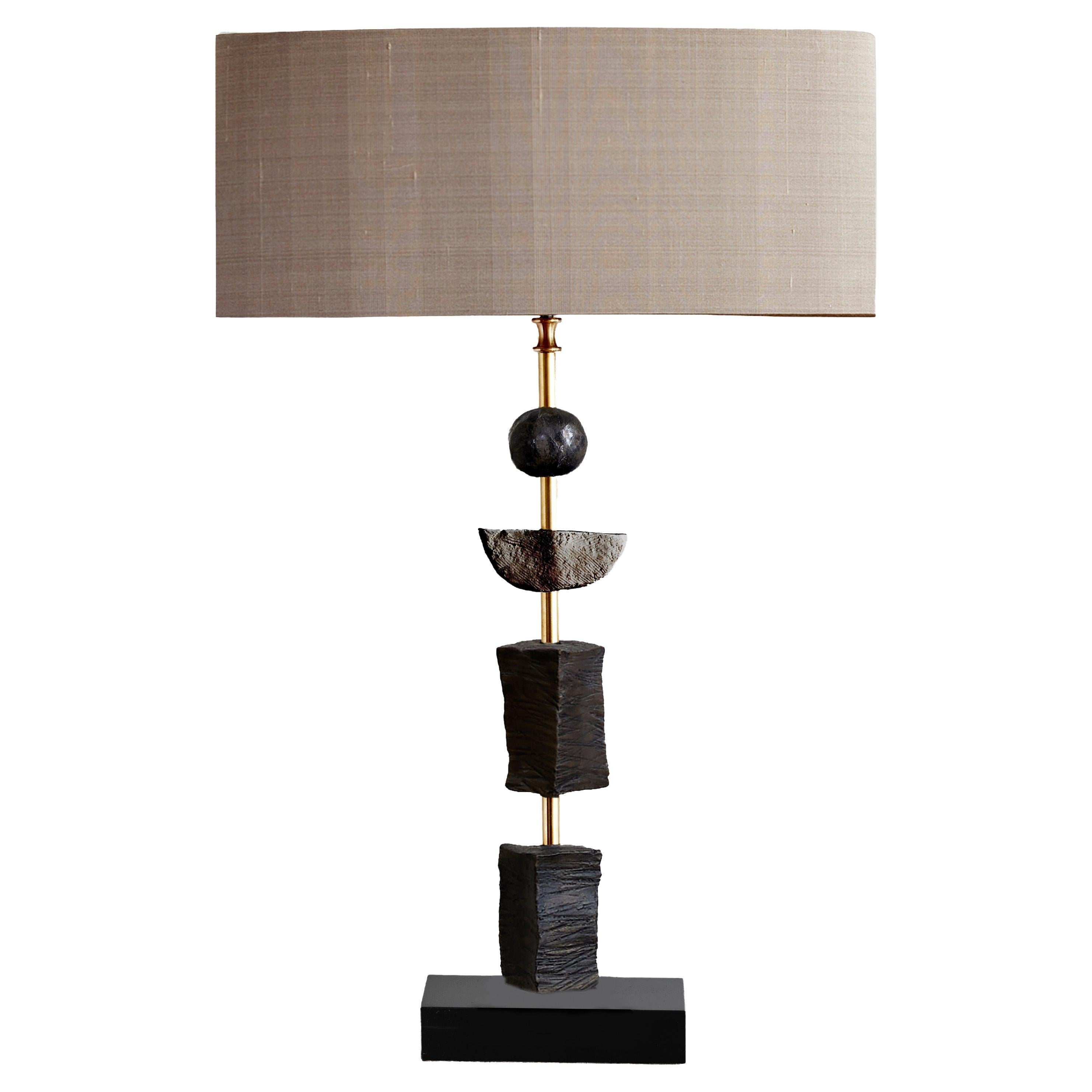 Sinergia  Lámparas de mesa en pátina oscura, europeas, contemporáneas by Margit Wittig