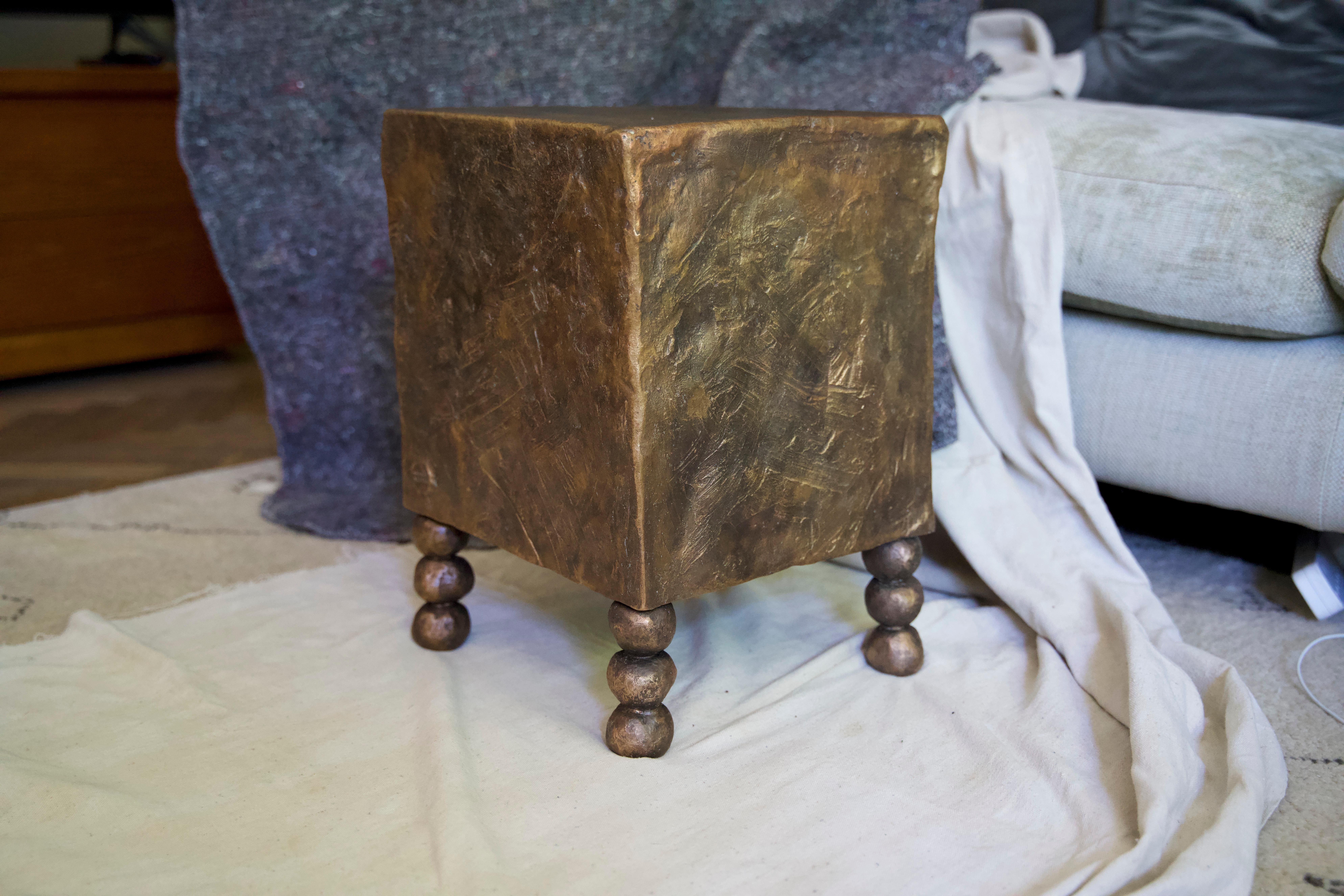 
The Manhattan cube is a deceptively simple side table, created by artist-designer Margit Wittig.
It replicates a shape which Margit is fond of and has previously used in lighting on a smaller scale, a slightly imperfect cuboid.
‘The designing of