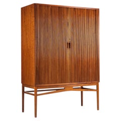 Danish high cabinet in teak with tambour doors Denmark 1960