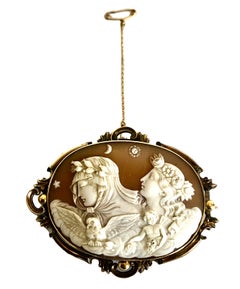 Broche antiguo de camafeo de concha que representa la noche y el día mitológicos, con estuche
