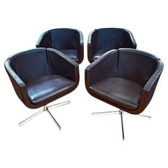 Set of four 21st-century “Tulip Sixty” Swivel Armchairs in Leather and Chrome